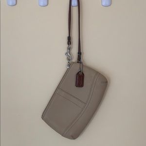 Tan Coach wristlet